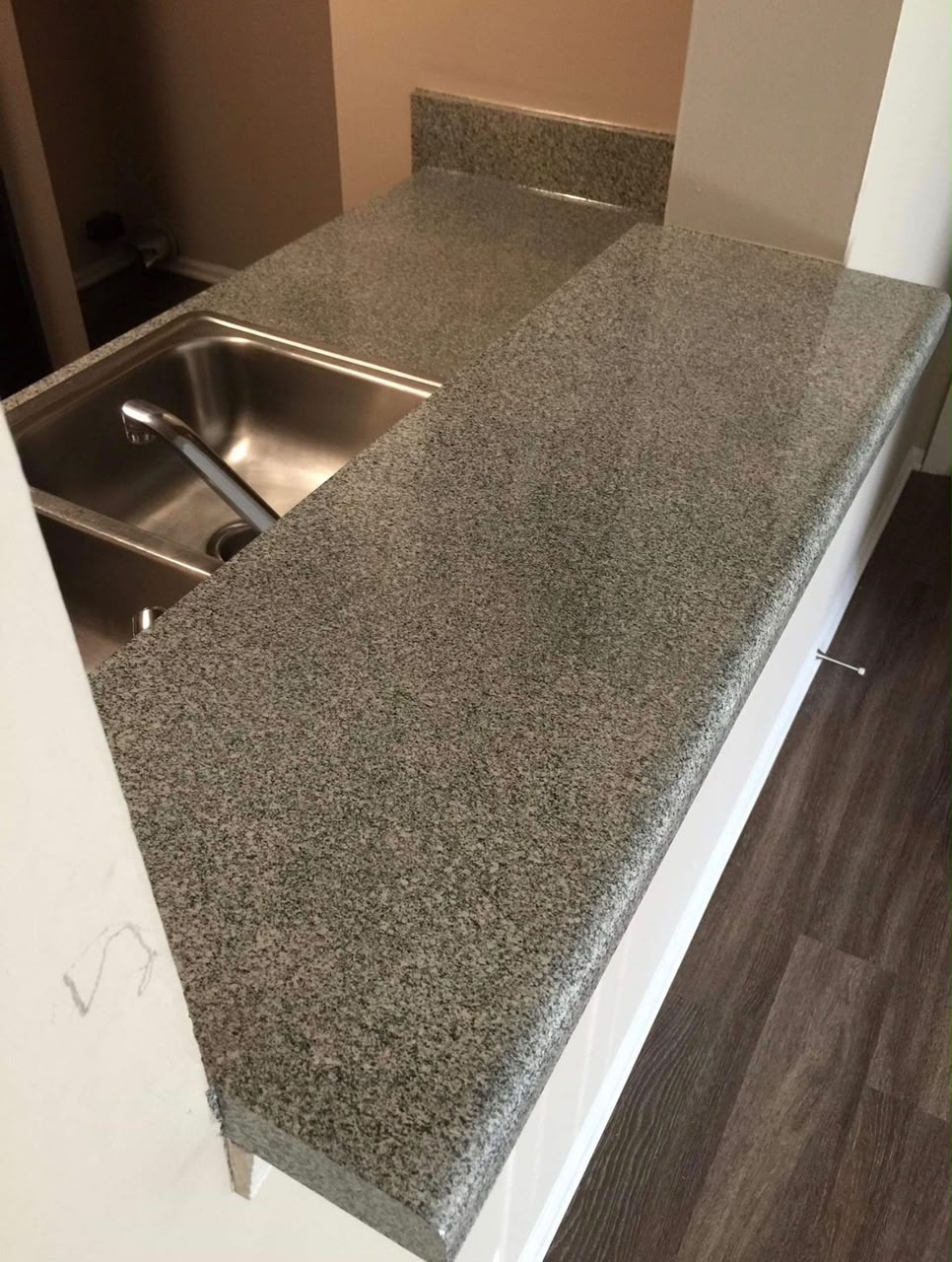 After — Dull, Stained White Formica Countertops → Renewed with Anew Stone Finish
