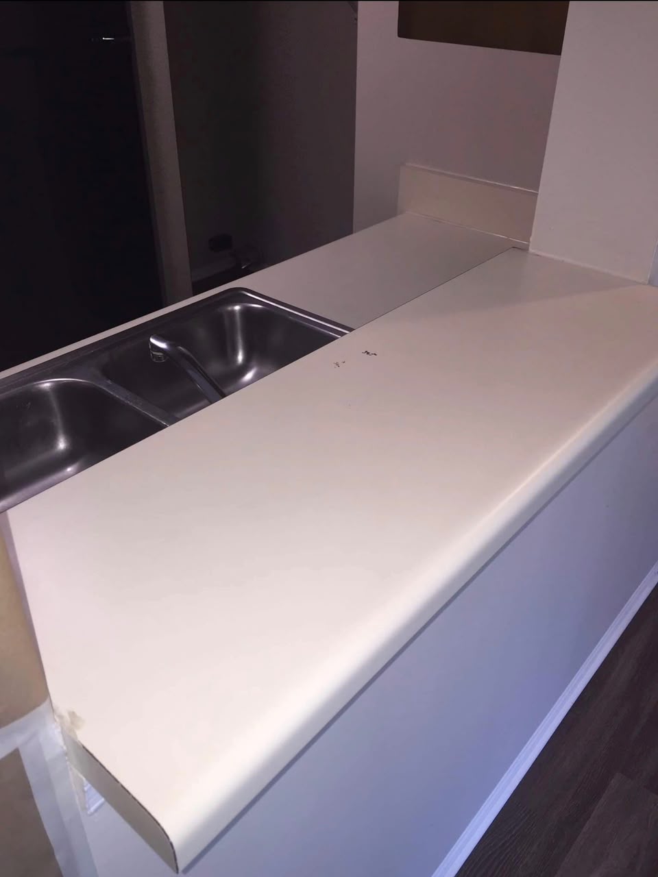 Before — Dull, Stained White Formica Countertops → Renewed with Anew Stone Finish